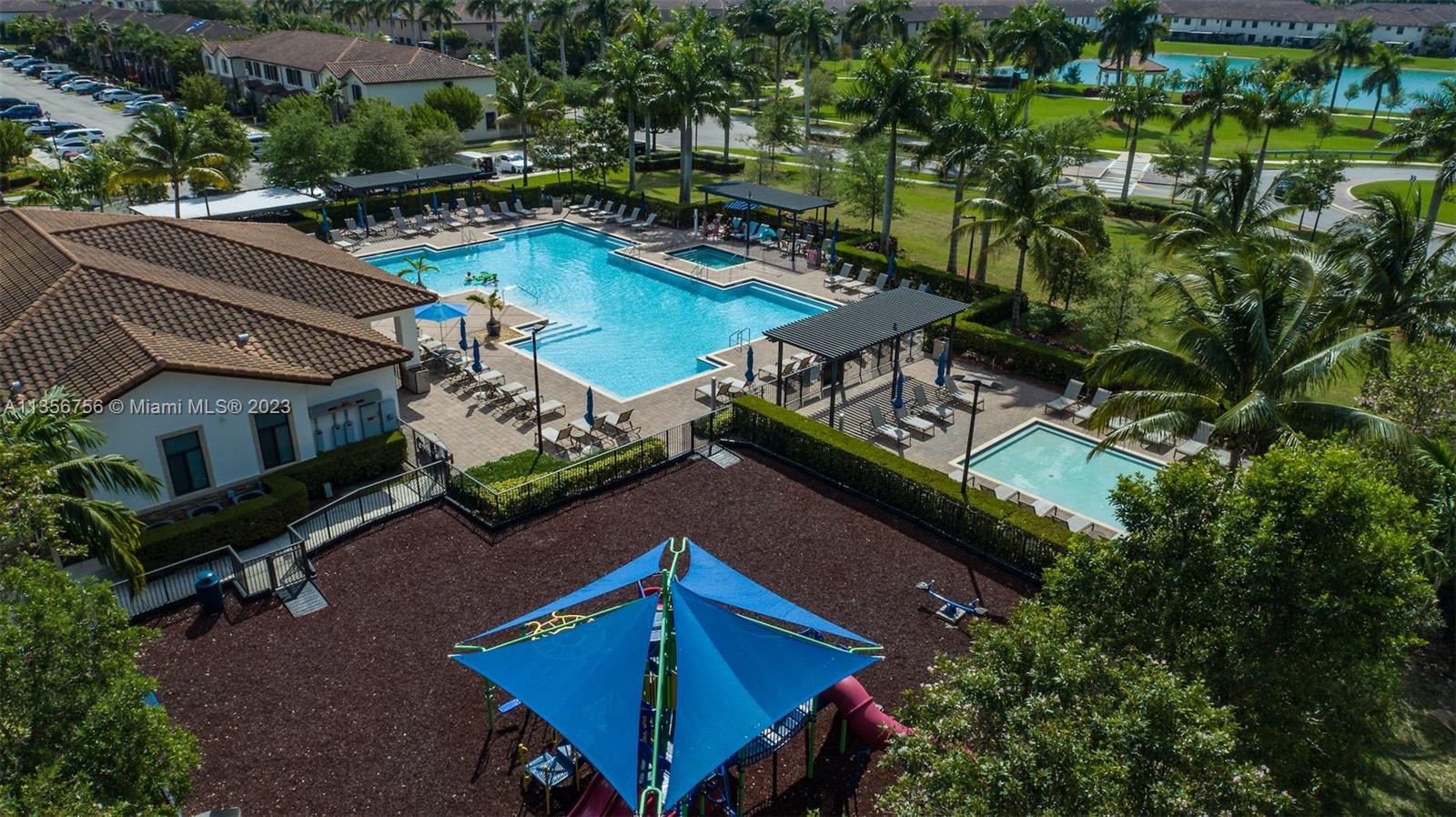 11444 Southwest 251st Street Homestead, FL 33032 - Photo 36 of 40 an aerial view of a house with swimming pool patio and outdoor seating