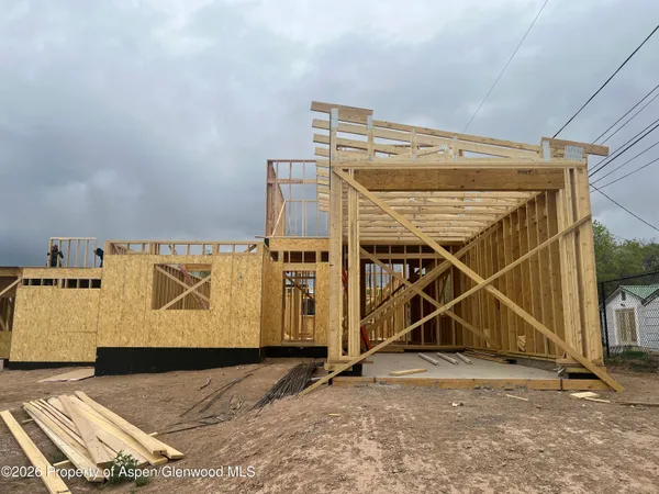 a view of a room with wooden walls