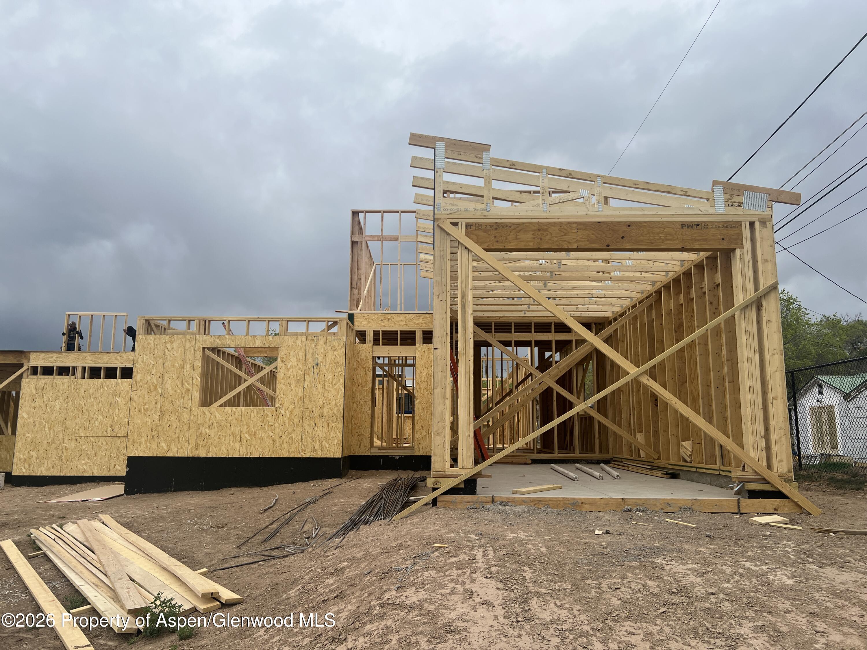 a view of a room with wooden walls