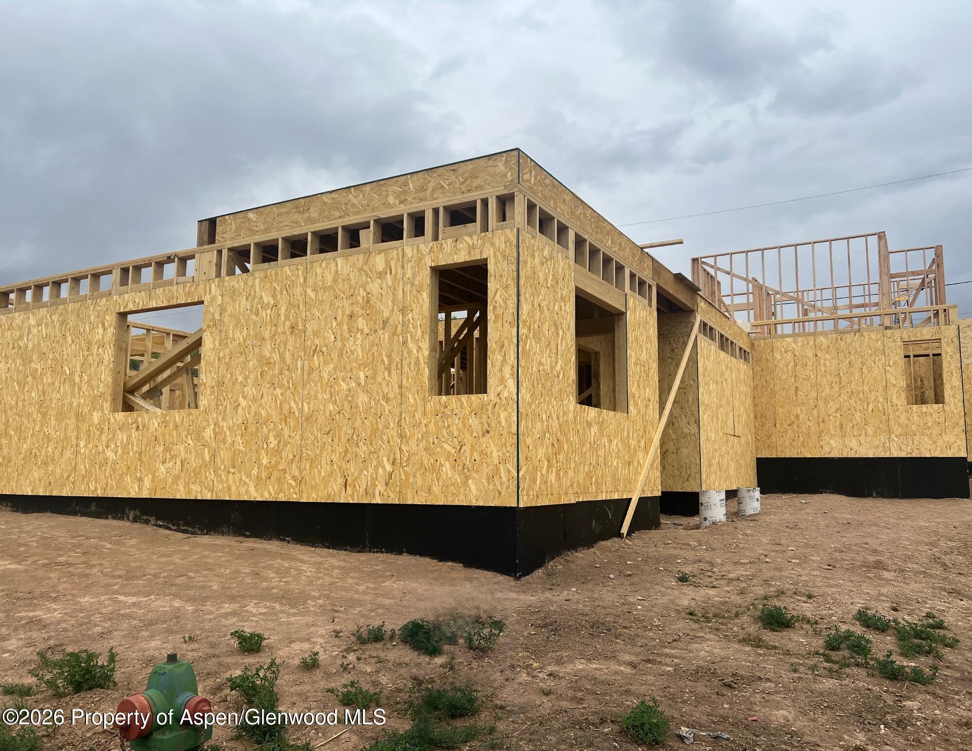 600 McCarron Court, Unit B Rifle, CO 81650 - Photo 2 of 3 a view of front door of house