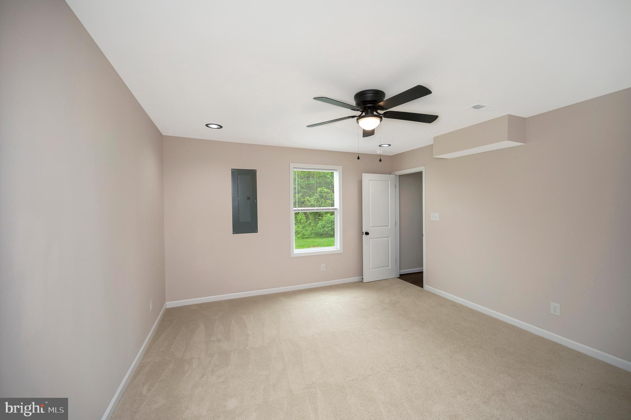 14169 Silver Hill Road Sumerduck, VA 22742 - Photo 19 of 40 a view of an empty room with a window