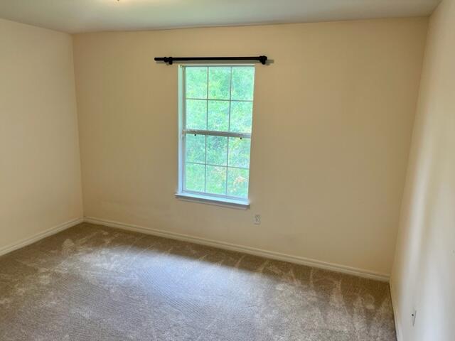 306 Shield Drive Crestview, FL 32539 - Photo 11 of 16 an empty room with a window