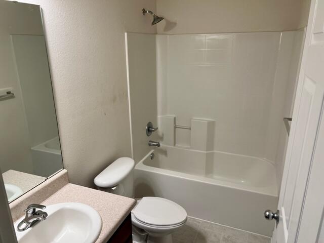 306 Shield Drive Crestview, FL 32539 - Photo 14 of 16 a bathroom with a sink a toilet and shower