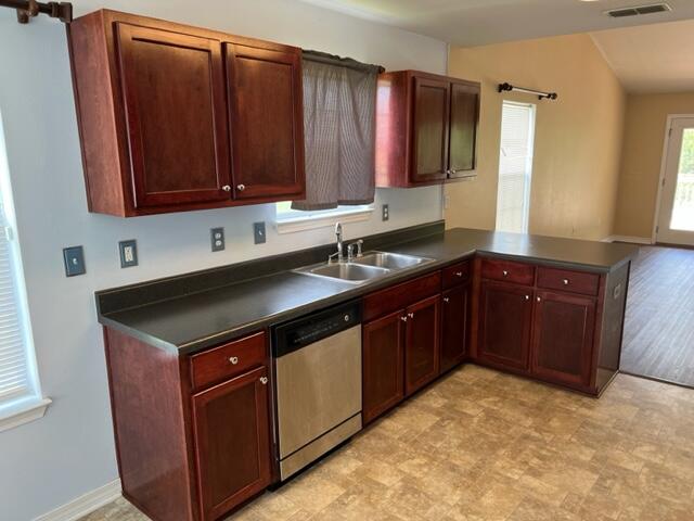 306 Shield Drive Crestview, FL 32539 - Photo 5 of 16 a kitchen with a sink and a cabinets