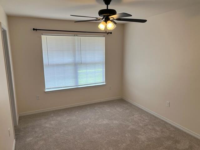 306 Shield Drive Crestview, FL 32539 - Photo 10 of 16 an empty room with a window
