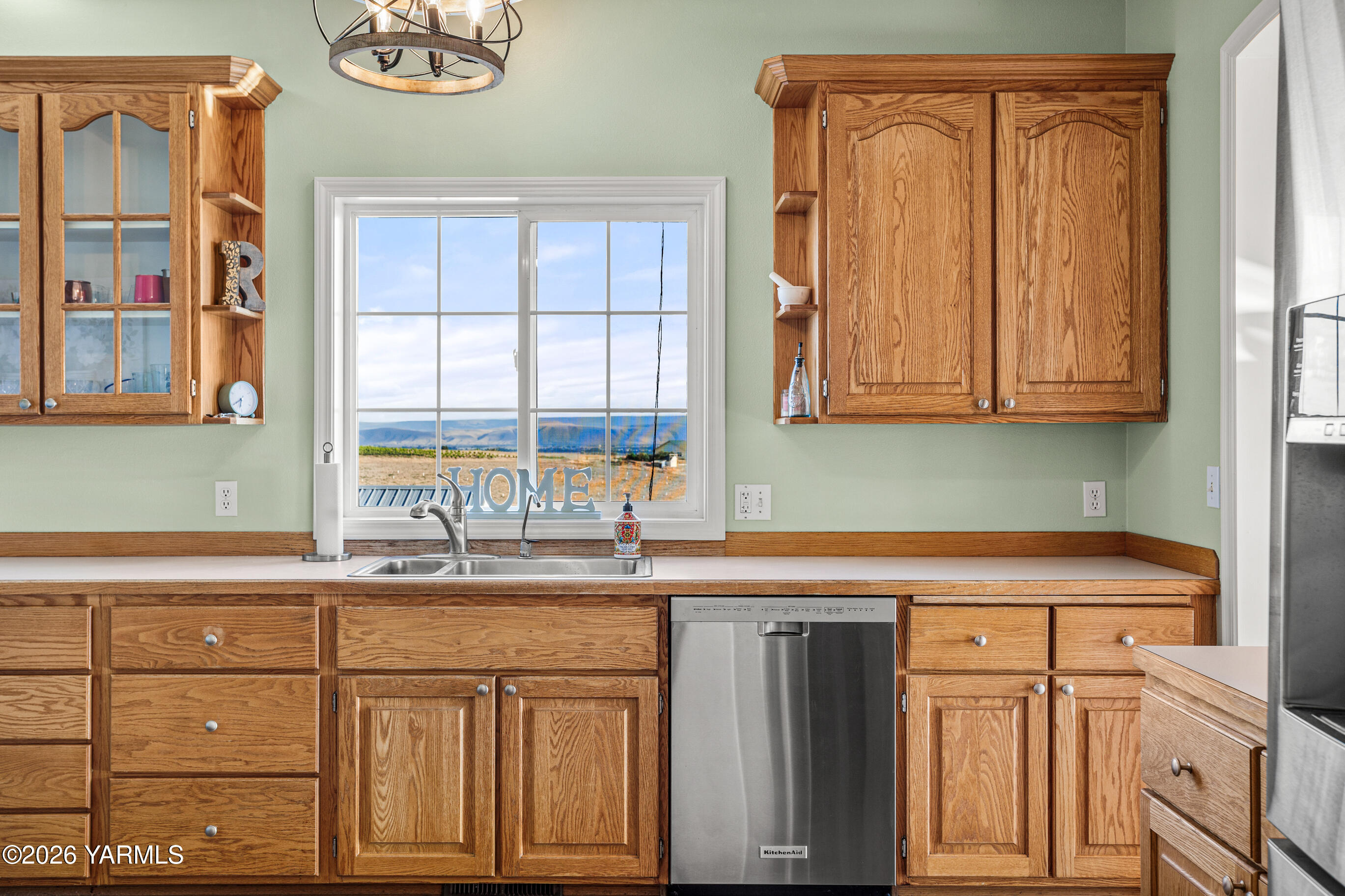 5060 Lombard Loop Road Zillah, WA 98953 - Photo 26 of 65 a kitchen with stainless steel appliances granite countertop a sink and cabinets
