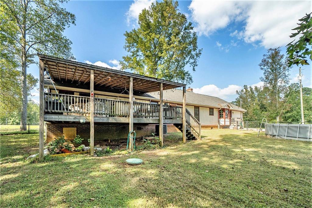 1736 Pleasant Grove Road Temple, GA 30179 - Photo 24 of 31 a view of a house with a yard balcony and sitting area