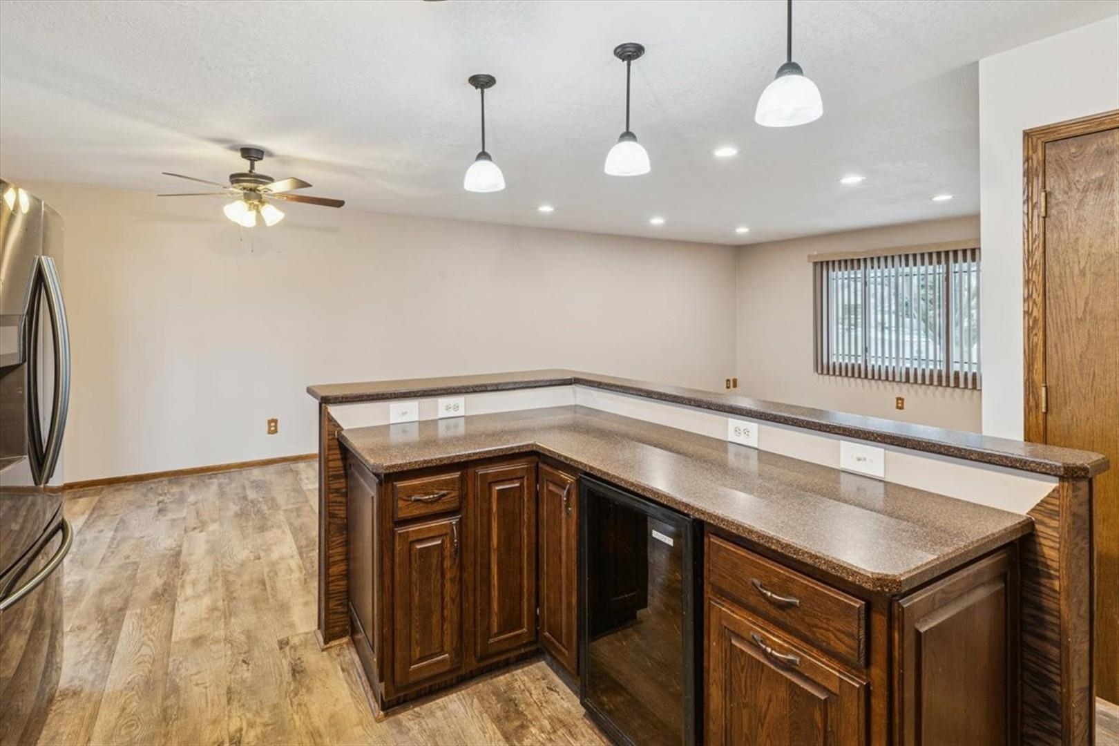 1045 Sweet Briar Lane Clinton, IA 52732 - Photo 14 of 33 a kitchen with a stove a sink and a refrigerator