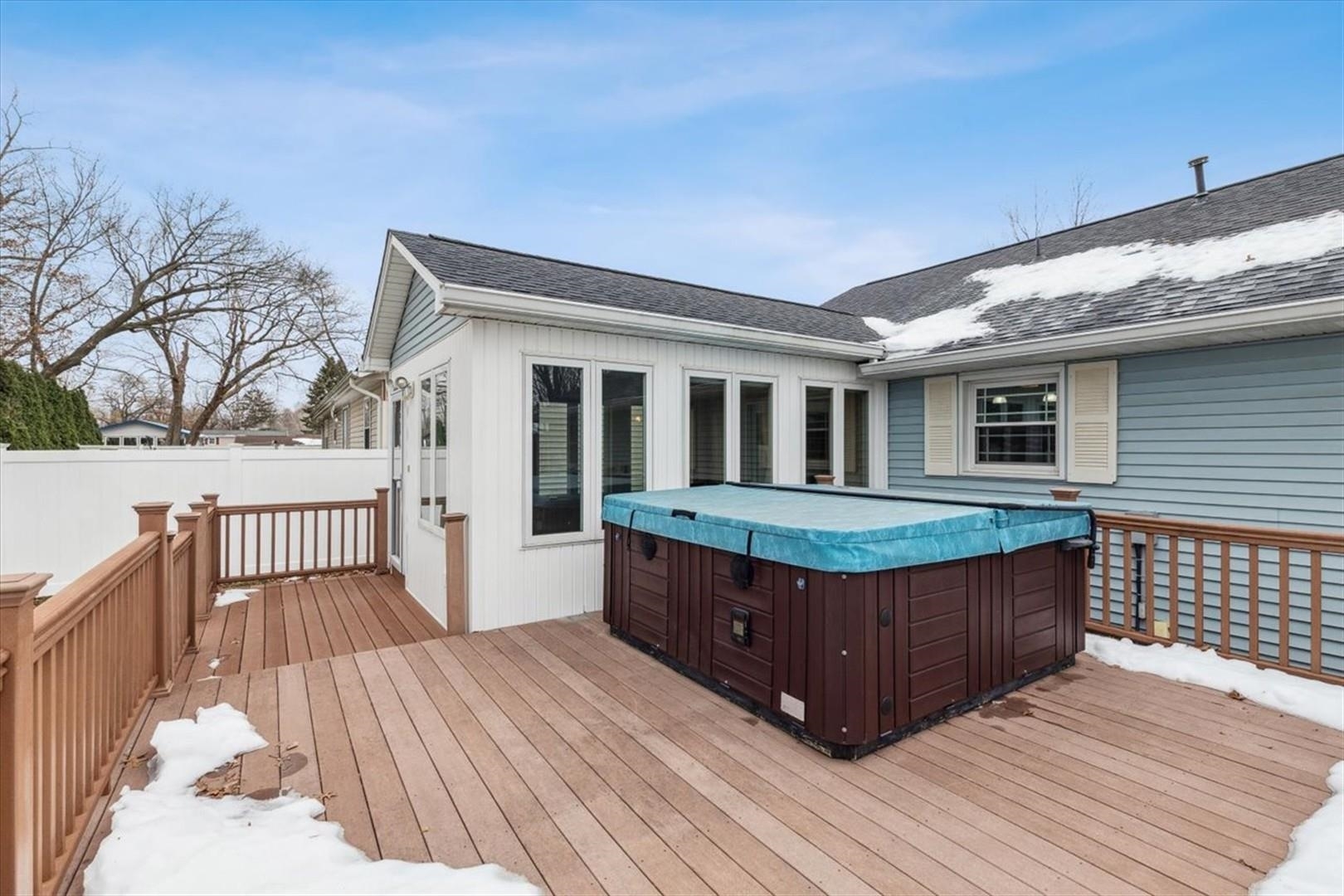 1045 Sweet Briar Lane Clinton, IA 52732 - Photo 18 of 33 a view of backyard with deck and wooden floor