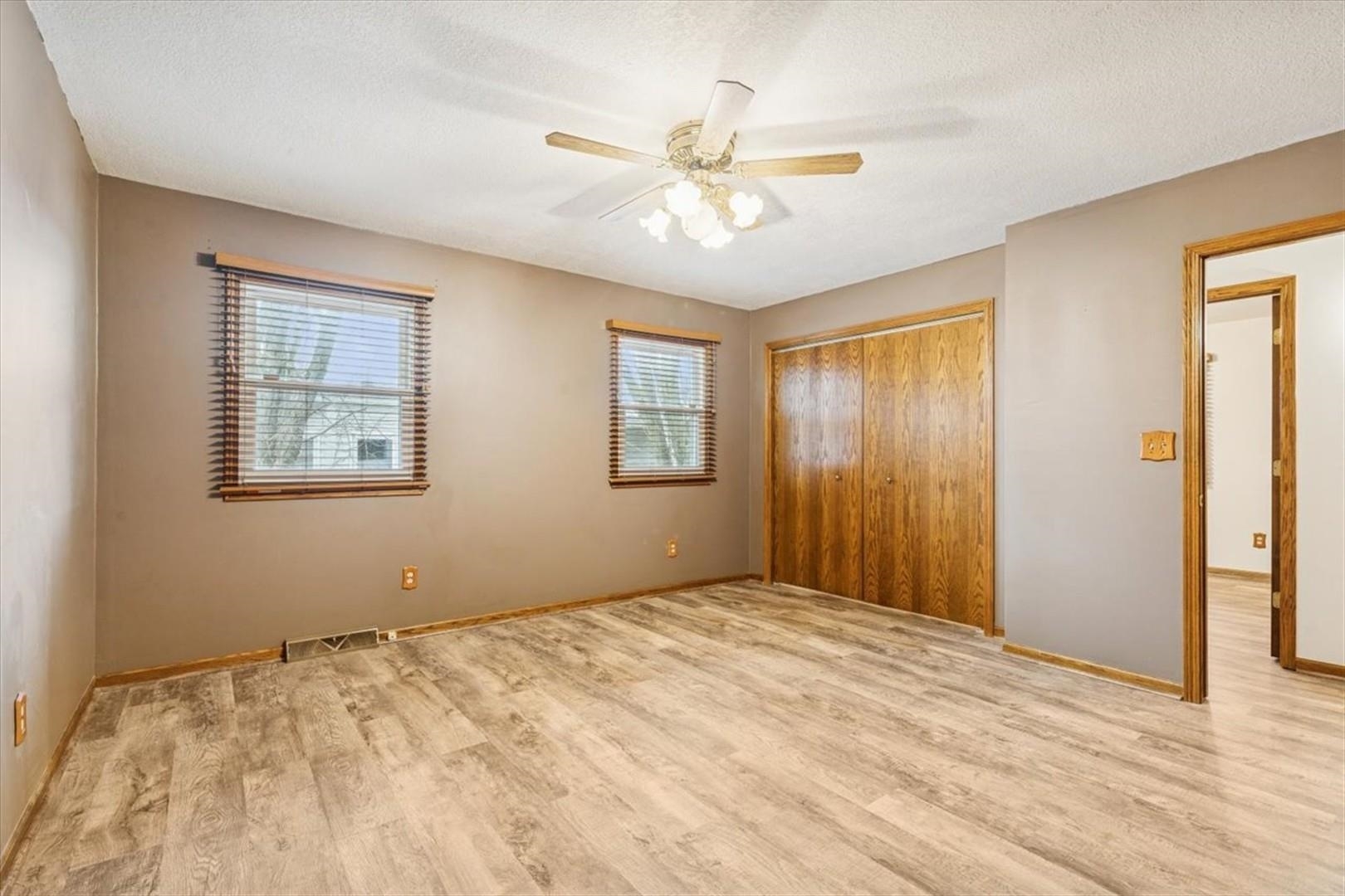 1045 Sweet Briar Lane Clinton, IA 52732 - Photo 19 of 33 a view of an empty room with a window