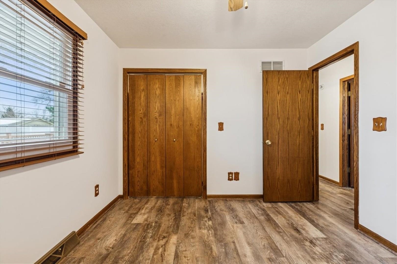 1045 Sweet Briar Lane Clinton, IA 52732 - Photo 23 of 33 a view of a room with wooden door