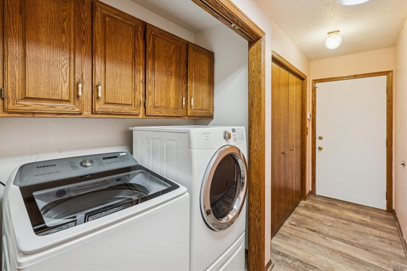 1045 Sweet Briar Lane Clinton, IA 52732 - Photo 27 of 33 a utility room with dryer and washer