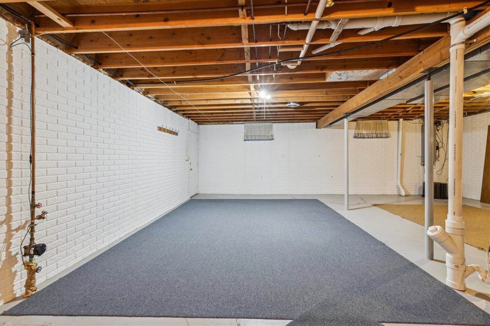 1045 Sweet Briar Lane Clinton, IA 52732 - Photo 30 of 33 a view of a room with wooden walls