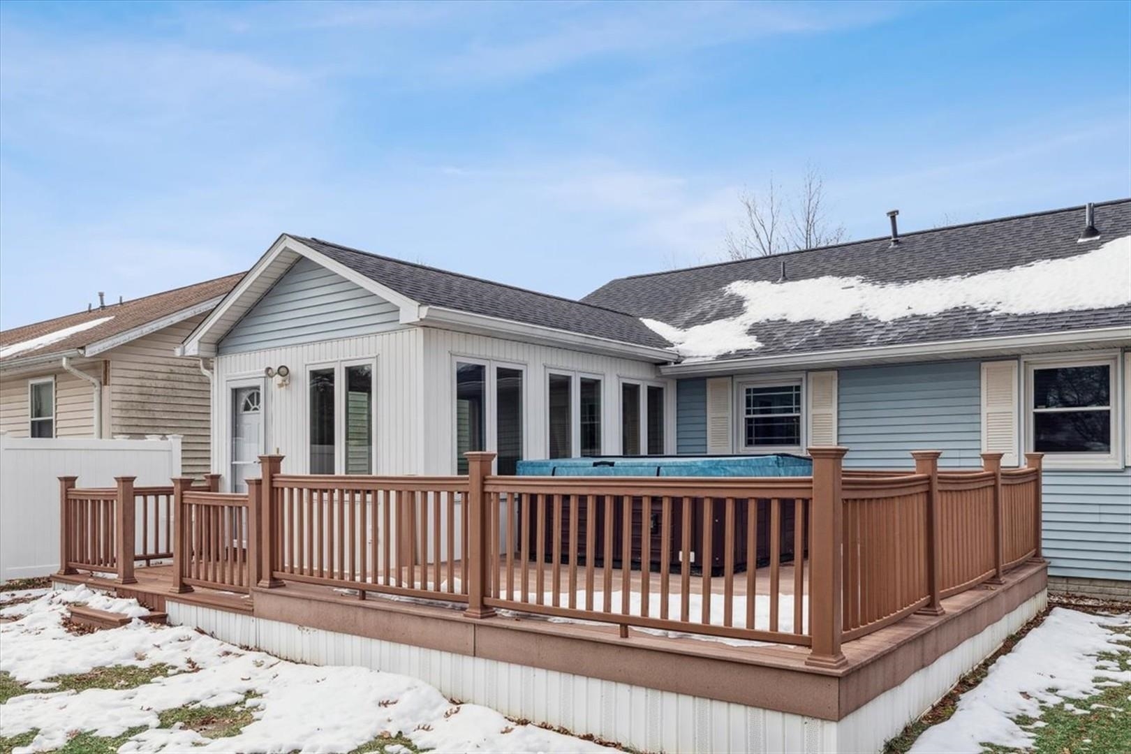 1045 Sweet Briar Lane Clinton, IA 52732 - Photo 4 of 33 a view of a house with a roof deck