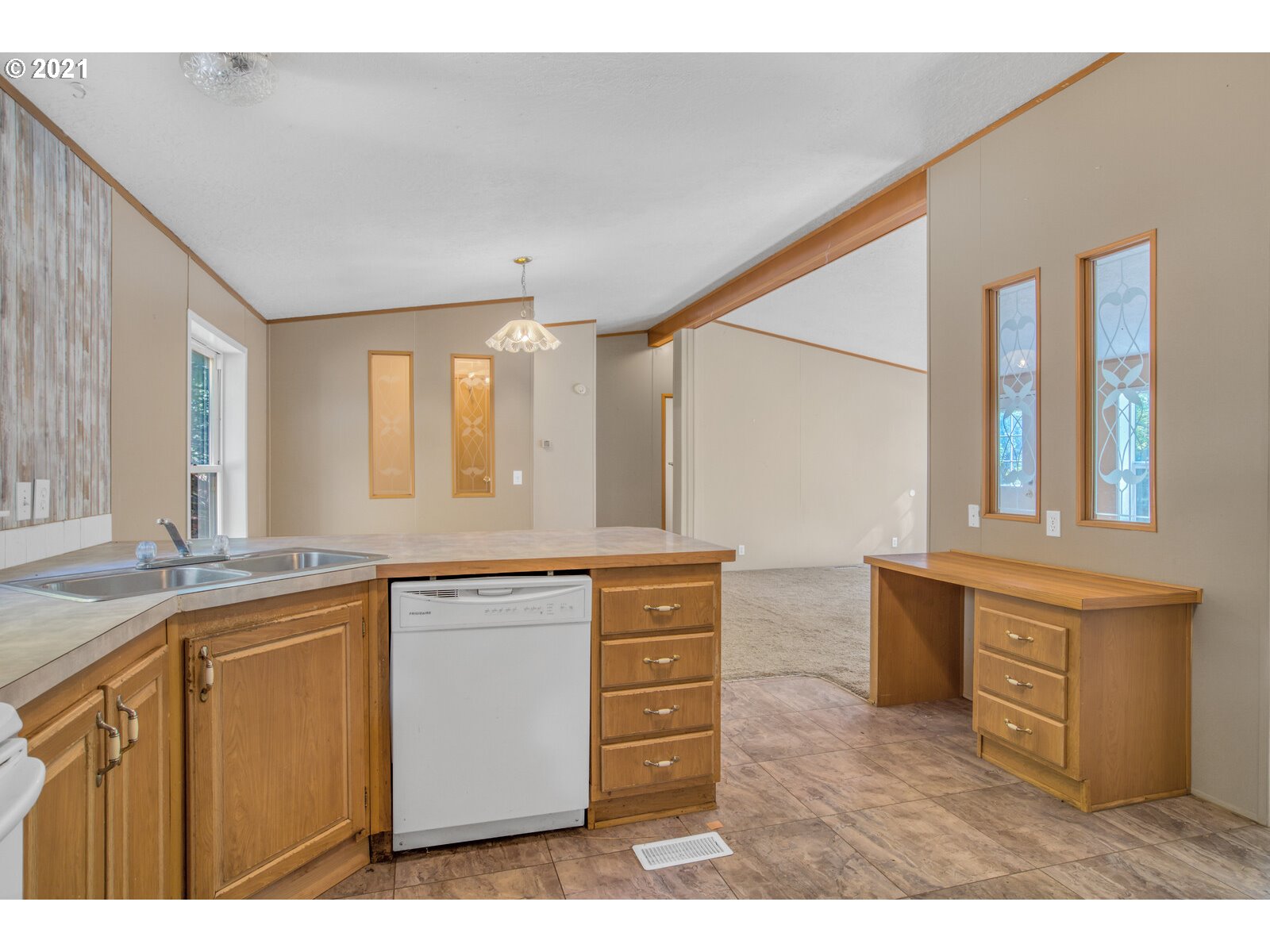 17241 Oakdale Road Dallas, OR 97338 - Photo 21 of 32 a kitchen with stainless steel appliances granite countertop a stove a sink and a microwave