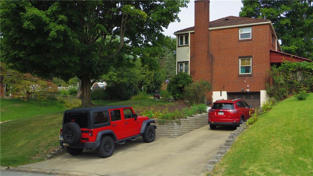 1203 Varner Road Pittsburgh, PA 15227 - Photo 3 of 24 1 car garage plus parking space for 3 cars in driveway!