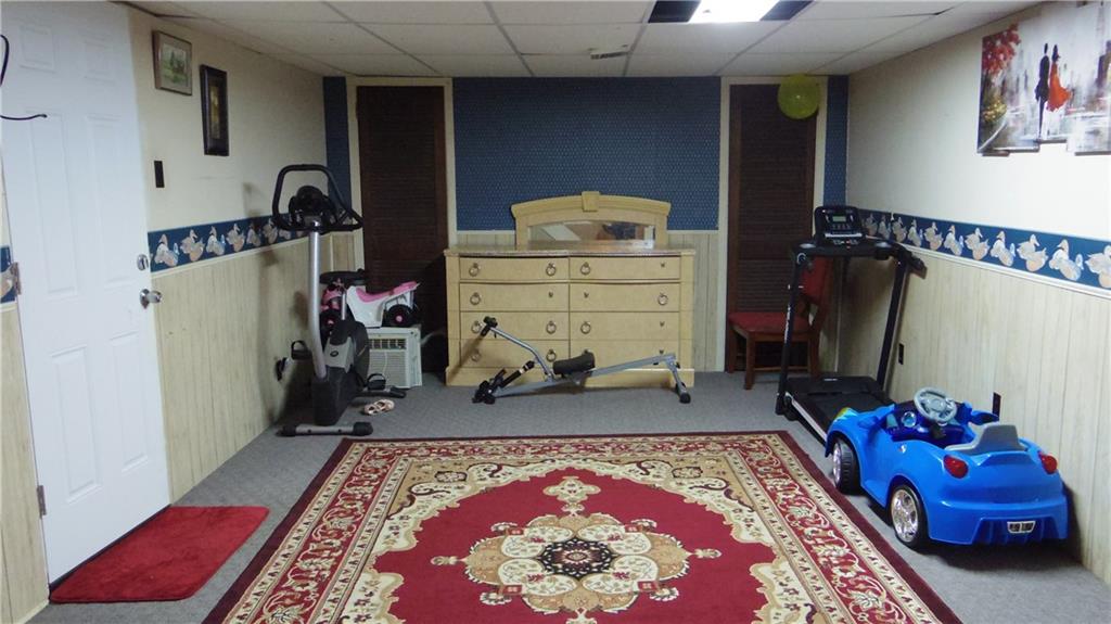 1203 Varner Road Pittsburgh, PA 15227 - Photo 22 of 24 Lower game room with connecting laundry and garage.