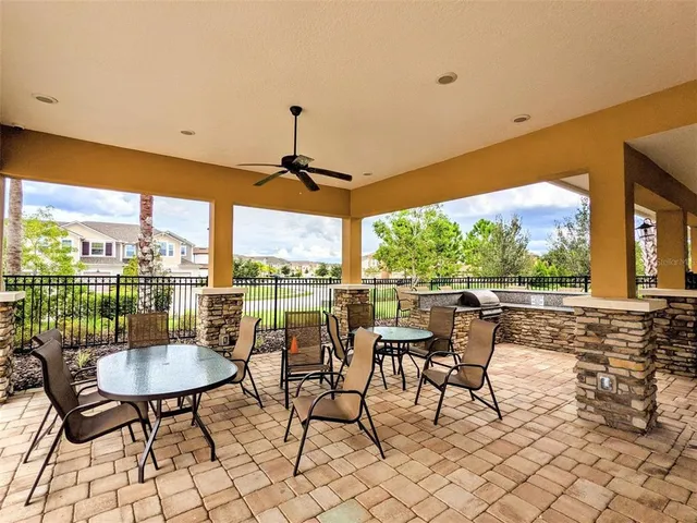 a view of a park with swings and slides