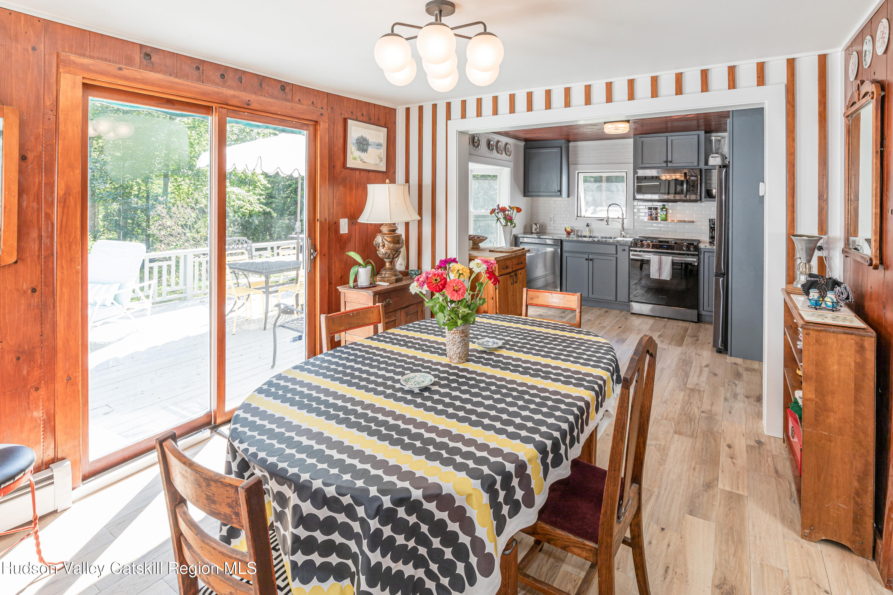 16 Bakertown Road Accord, NY 12404 - Photo 5 of 17 a bedroom with a bed and a chandelier