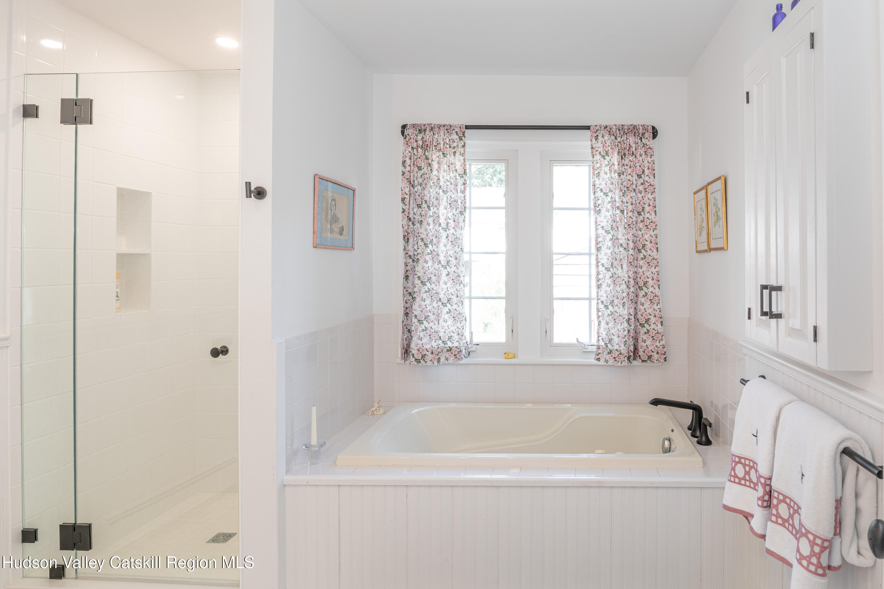 16 Bakertown Road Accord, NY 12404 - Photo 9 of 17 a bathroom with a bathtub and a shower