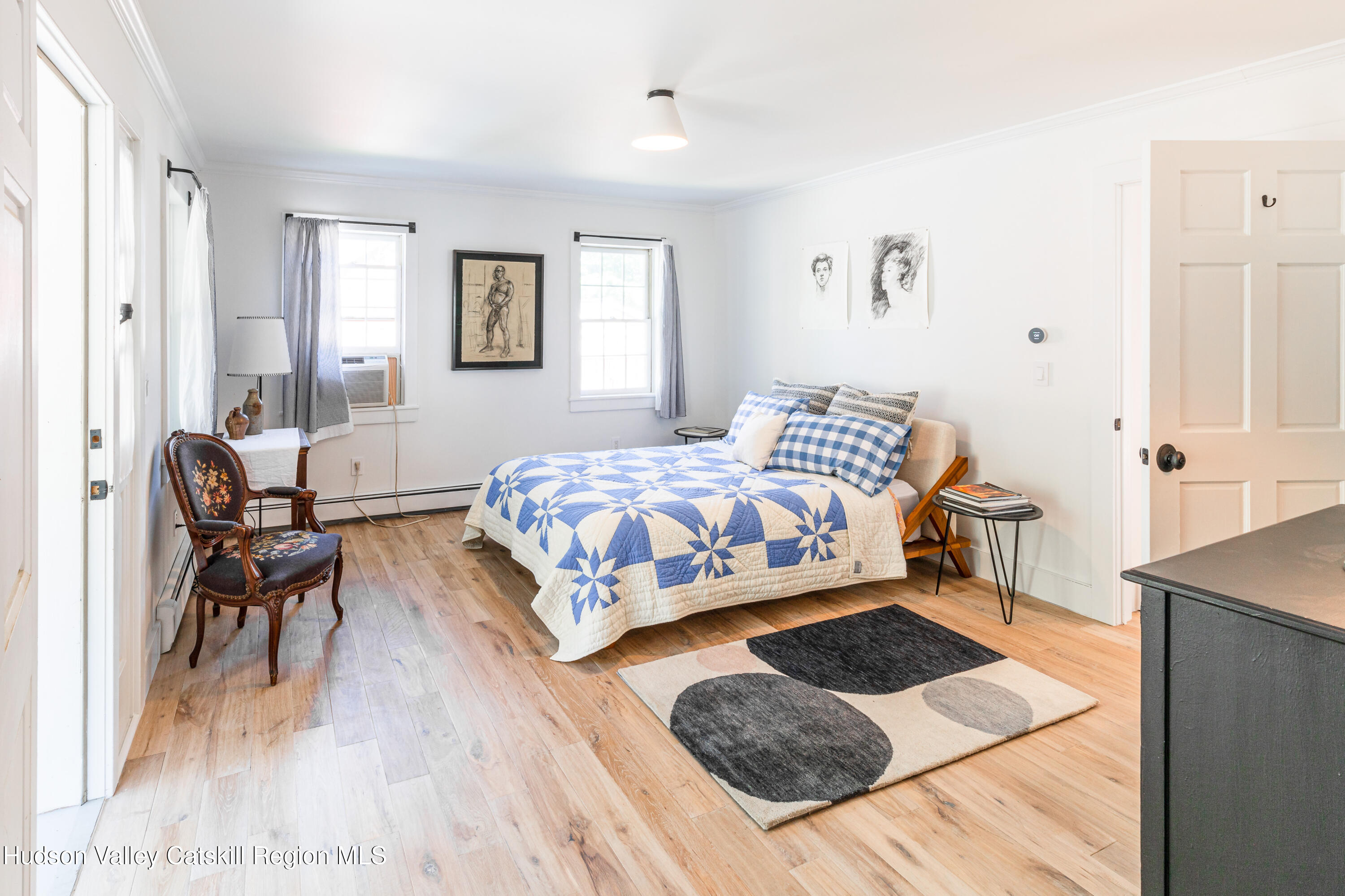 16 Bakertown Road Accord, NY 12404 - Photo 10 of 17 a bedroom with a bed lamp and furniture