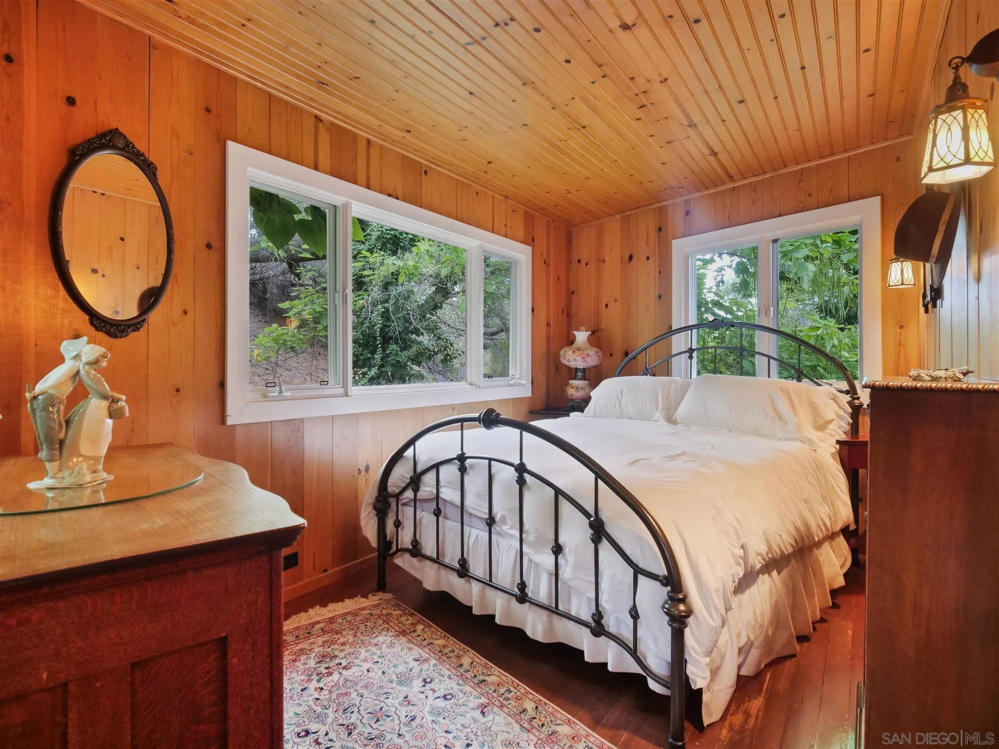 1102 Nicola Ranch Road Fallbrook, CA 92028 - Photo 21 of 63 a bed sitting in a room next to a window