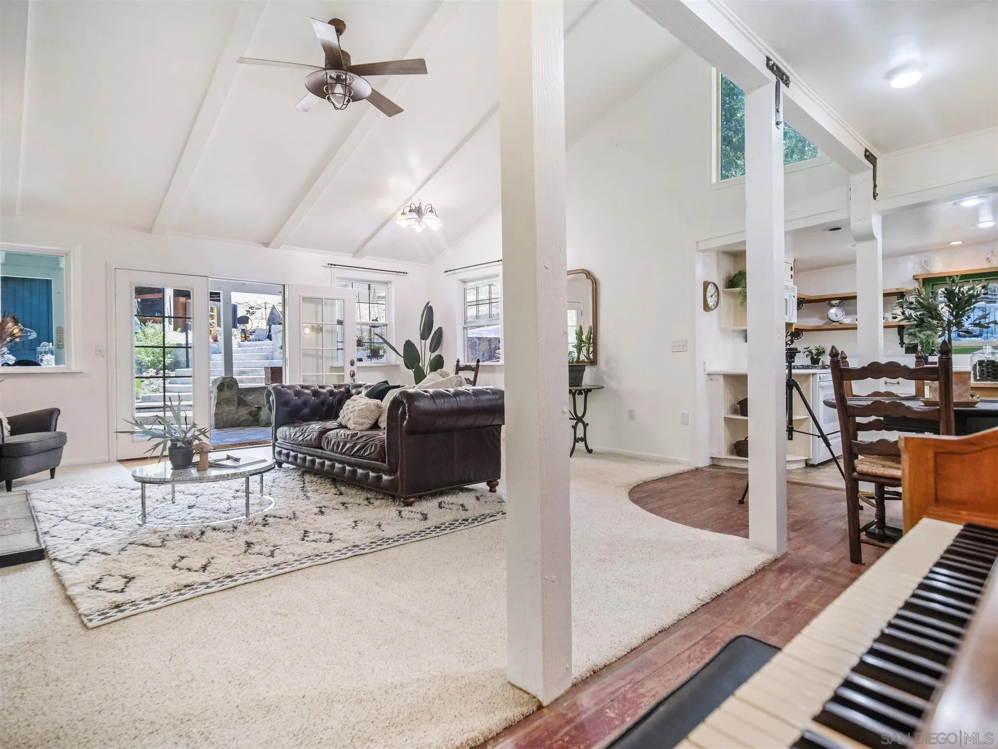 1102 Nicola Ranch Road Fallbrook, CA 92028 - Photo 28 of 63 a living room with lots of furniture and a table