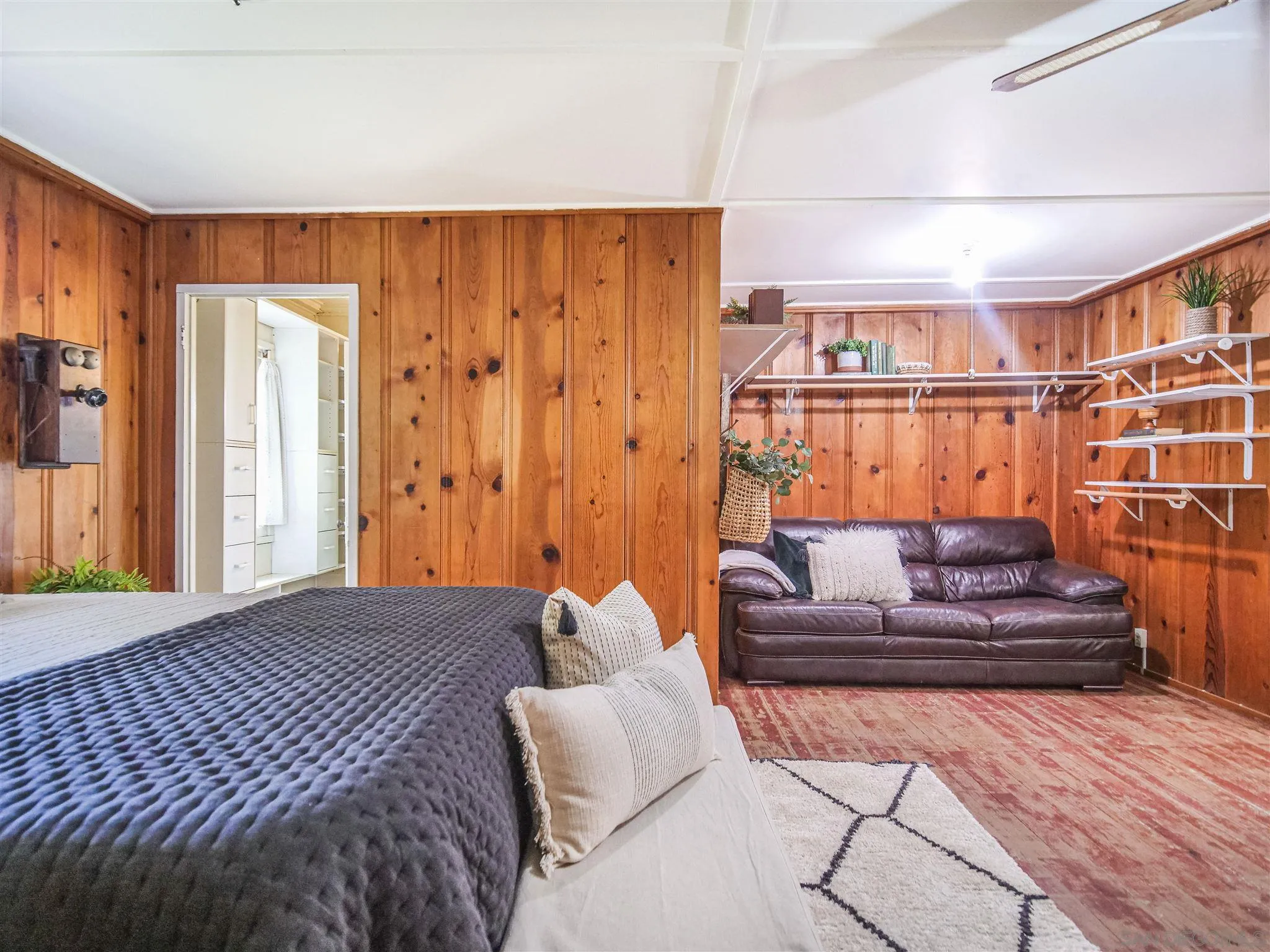 1102 Nicola Ranch Road Fallbrook, CA 92028 - Photo 34 of 63 a bedroom with furniture and stairs