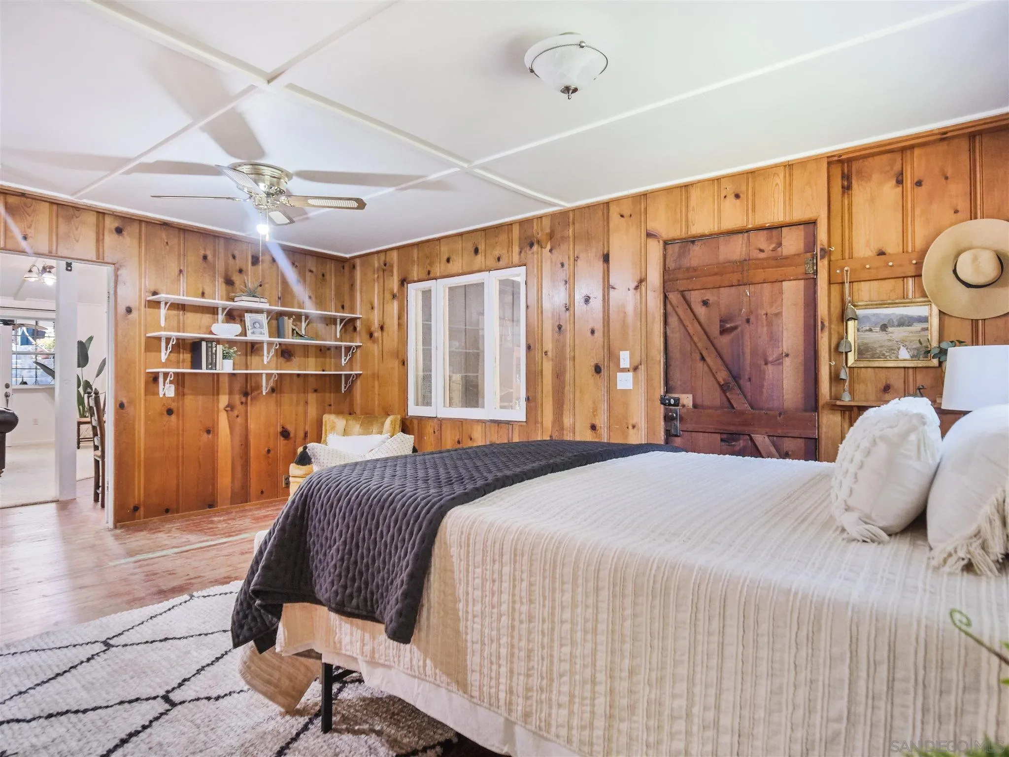 1102 Nicola Ranch Road Fallbrook, CA 92028 - Photo 35 of 63 a bedroom with a large bed and a window