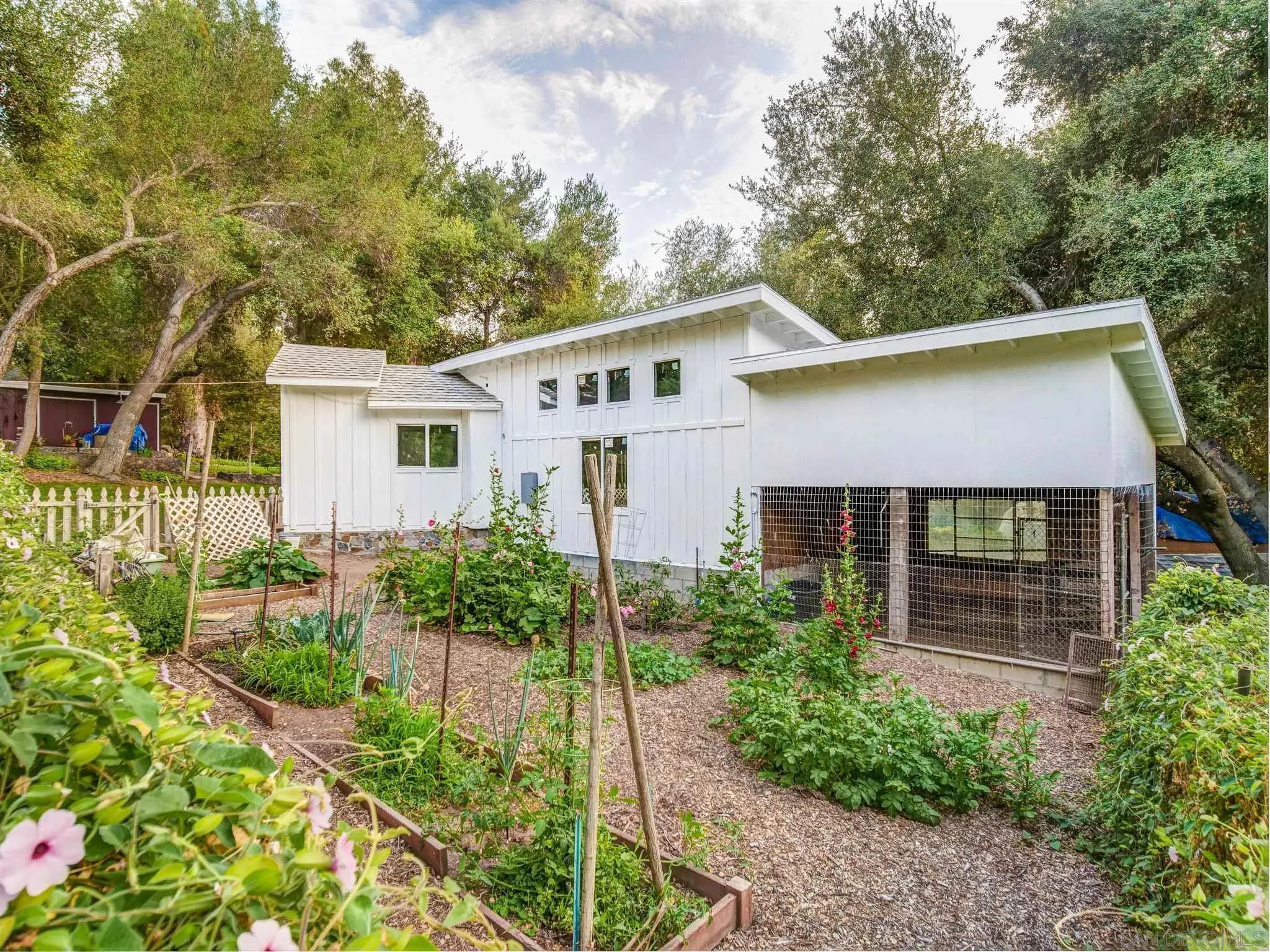 1102 Nicola Ranch Road Fallbrook, CA 92028 - Photo 45 of 63 a house that has a lot of plants in it