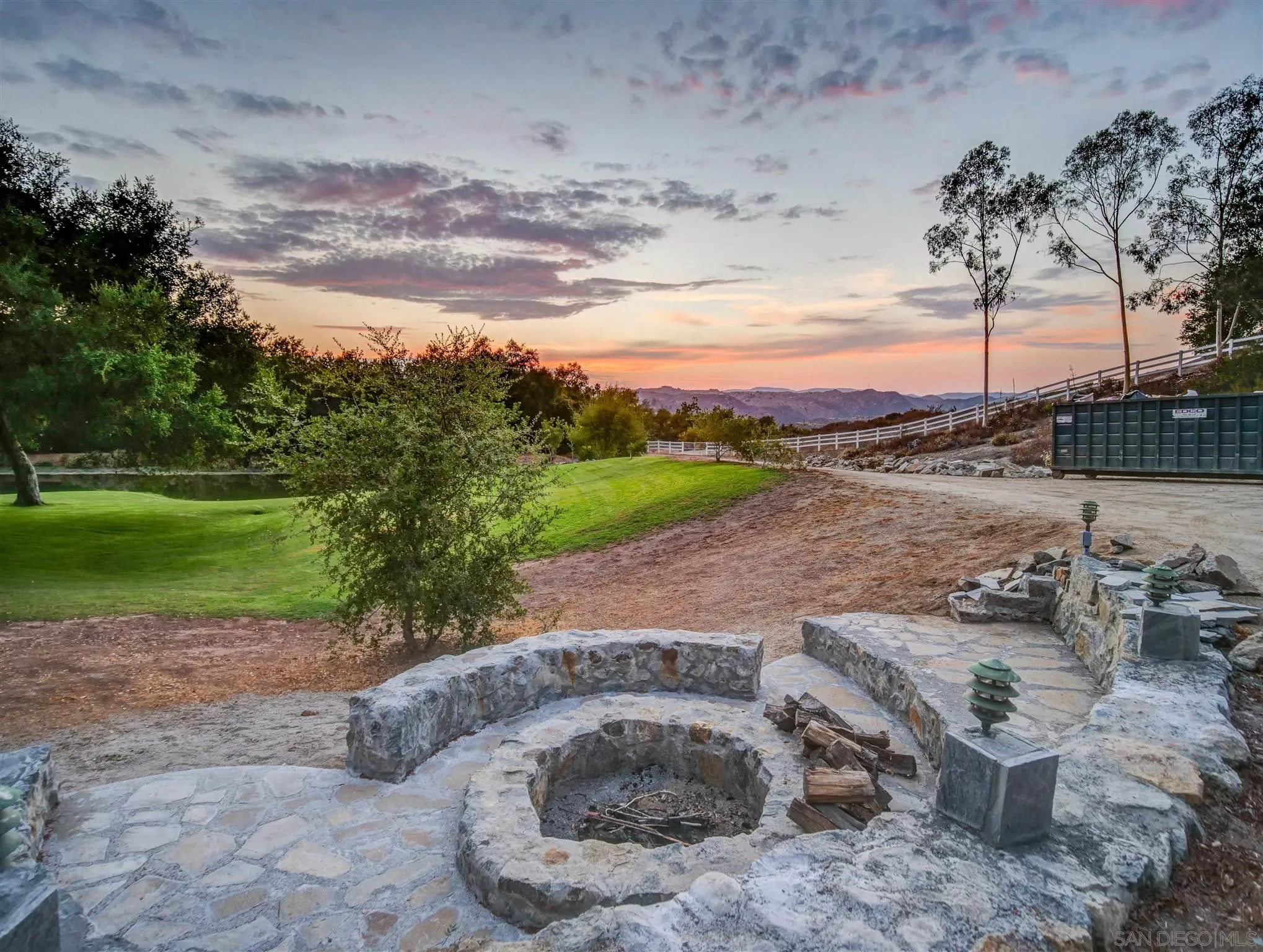 1102 Nicola Ranch Road Fallbrook, CA 92028 - Photo 57 of 63 a view of a fire pit with a yard