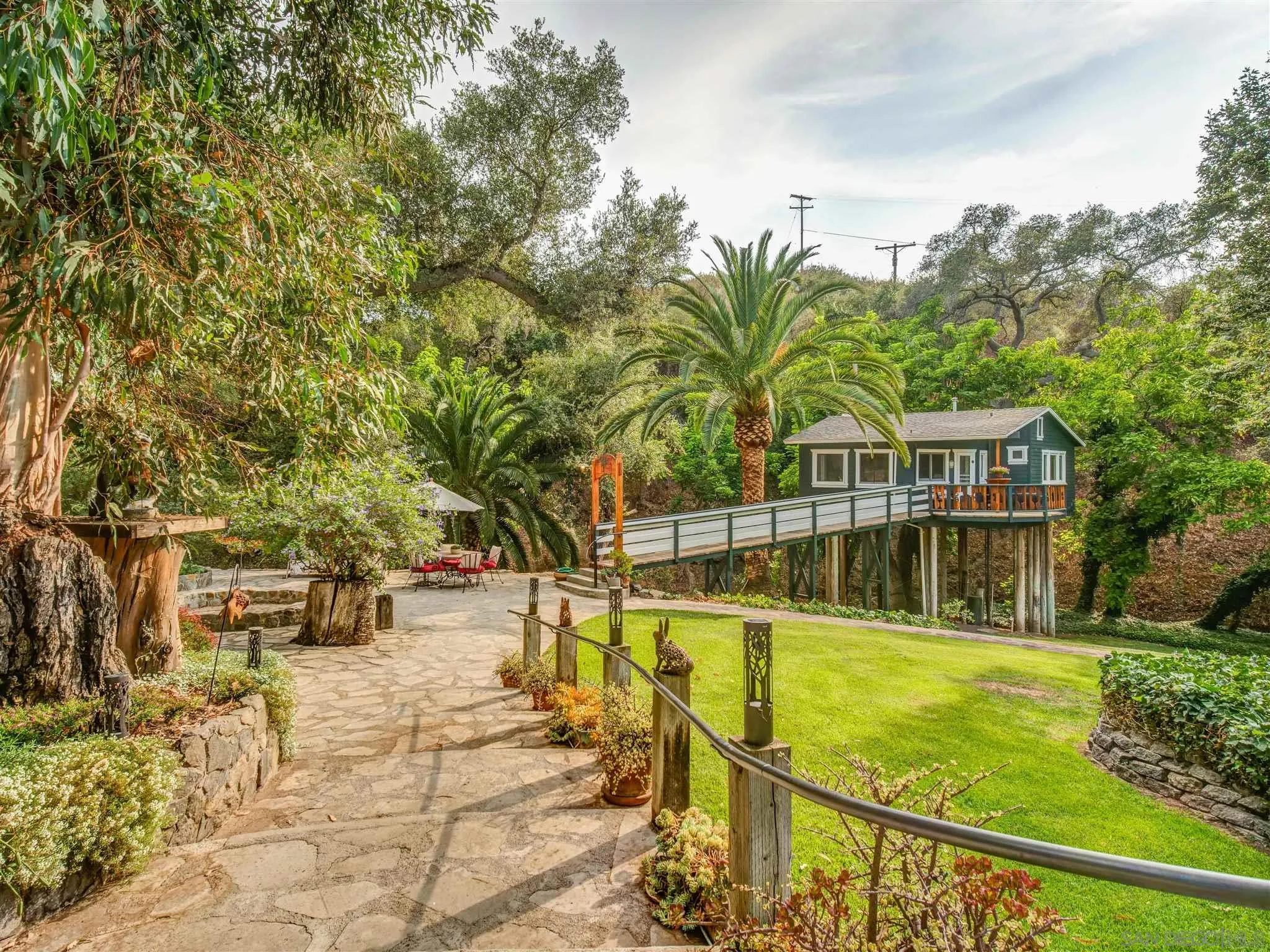 1102 Nicola Ranch Road Fallbrook, CA 92028 - Photo 63 of 63 a view of swimming pool with lawn chairs and plants