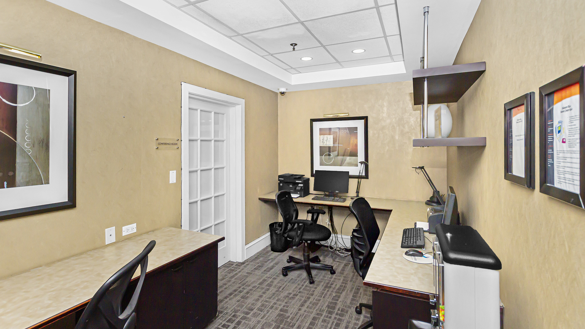 33 West Delaware Place, Unit 10G Chicago, IL 60610 - Photo 16 of 20 a view of a workspace with furniture and a window