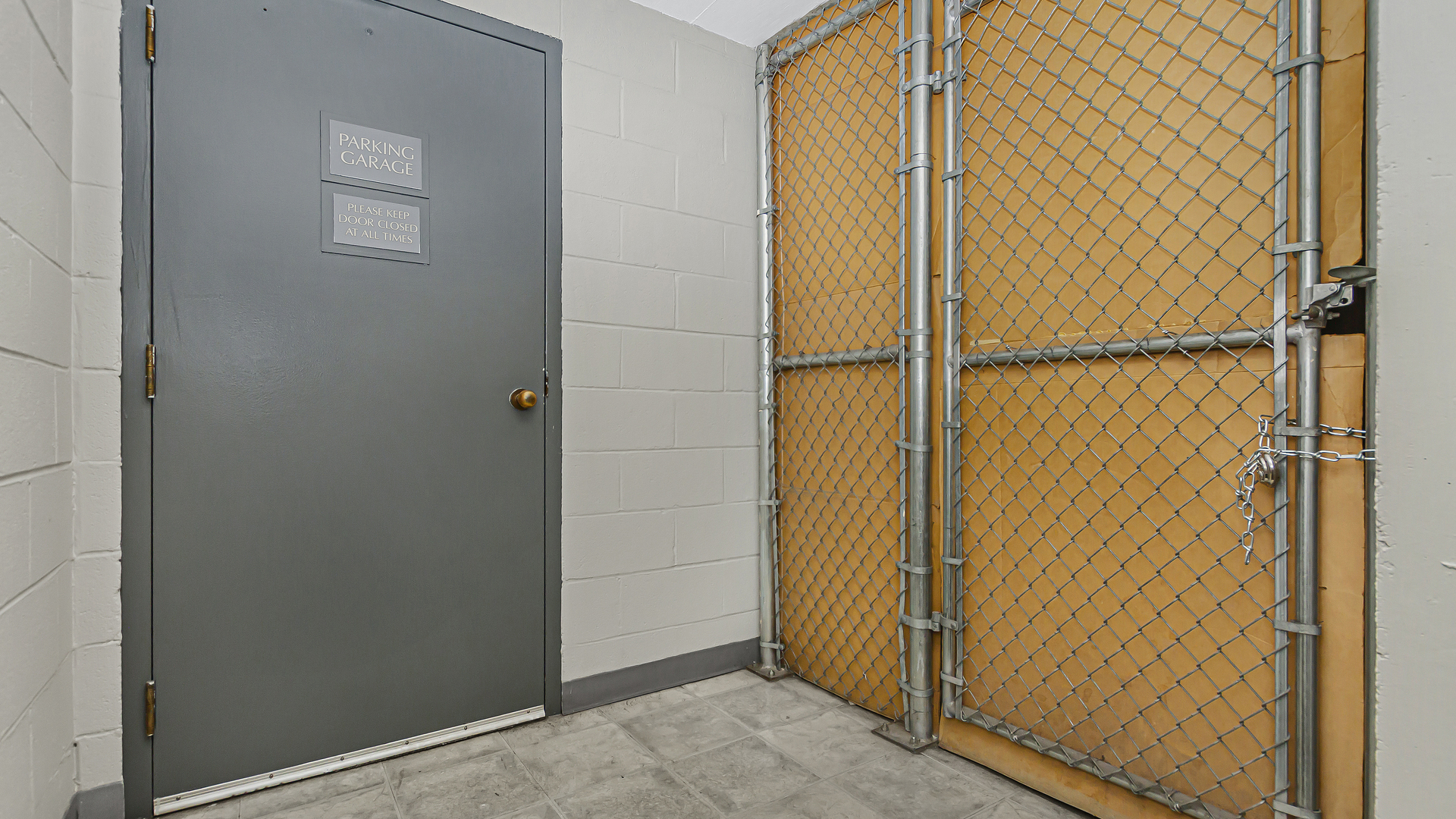 33 West Delaware Place, Unit 10G Chicago, IL 60610 - Photo 18 of 20 an empty room with a door