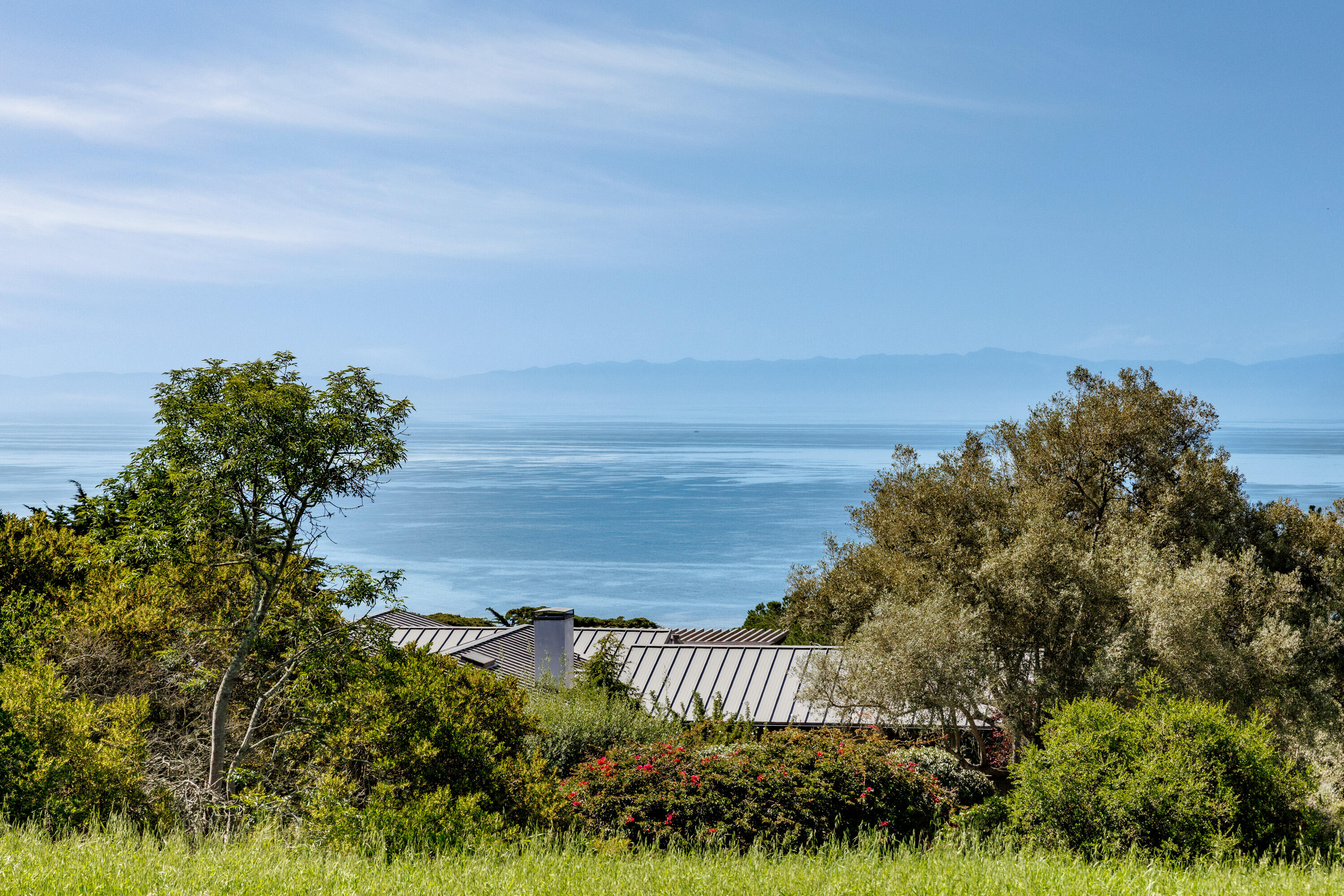 3324 Campanil Drive Santa Barbara, CA 93109 - Photo 22 of 42 a view of a yard in front of a house