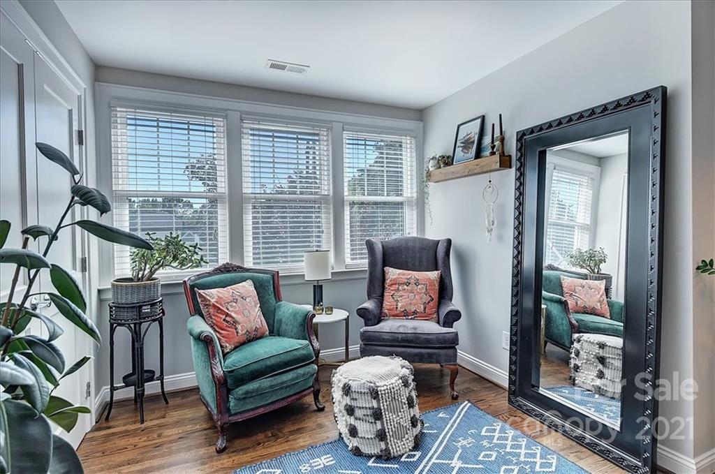 3404 Ritch Avenue Charlotte, NC 28206 - Photo 11 of 33 a living room with furniture and a floor to ceiling window