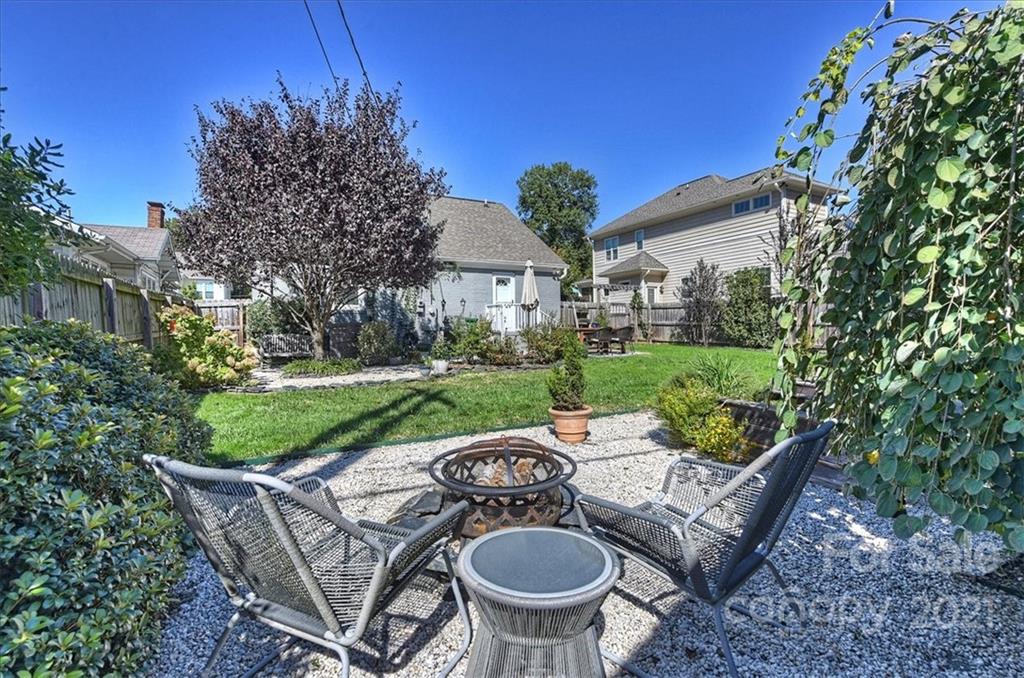 3404 Ritch Avenue Charlotte, NC 28206 - Photo 21 of 33 a view of a patio with furniture and garden