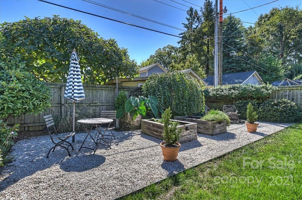 3404 Ritch Avenue Charlotte, NC 28206 - Photo 22 of 33 a view of a backyard with plants and patio