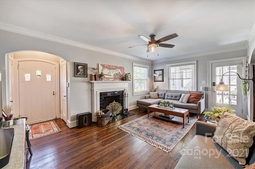 3404 Ritch Avenue Charlotte, NC 28206 - Photo 7 of 33 a living room with furniture and a fireplace