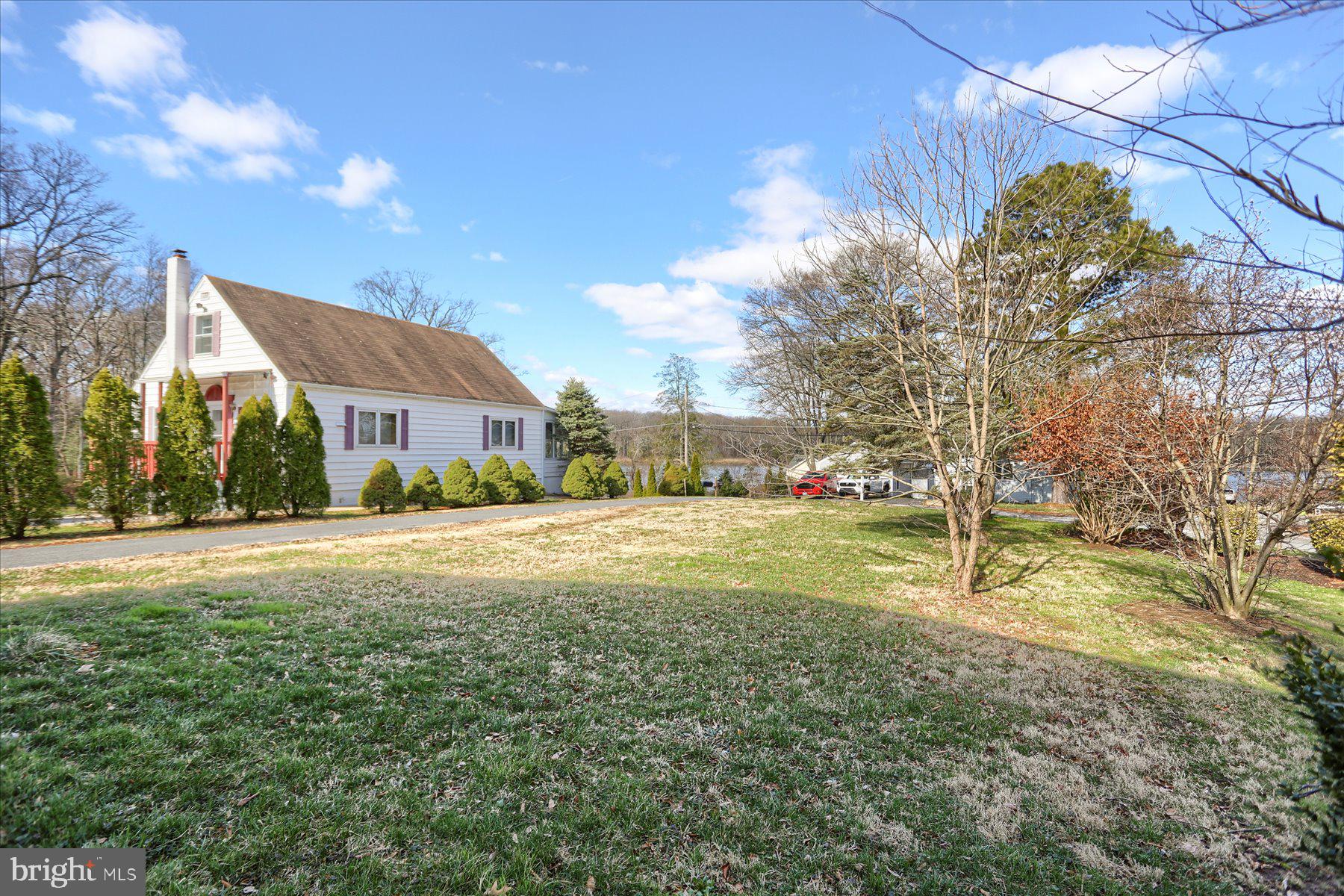 2507 Island View Road Essex, MD 21221 - Photo 44 of 51 a view of an house with backyard and a tree