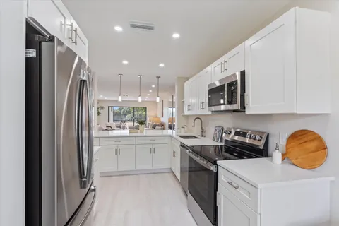 $99,990 | 47 Stratford Lane West, Unit F, Boynton Beach, FL 33436