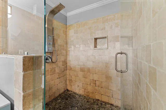 a view of a grassy field with trees