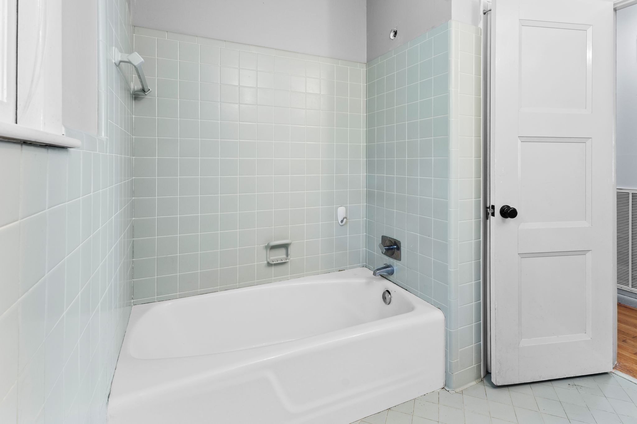 483 Franklin Road Franklin, TN 37069 - Photo 26 of 48 a white bath tub sitting next to a white cabinet