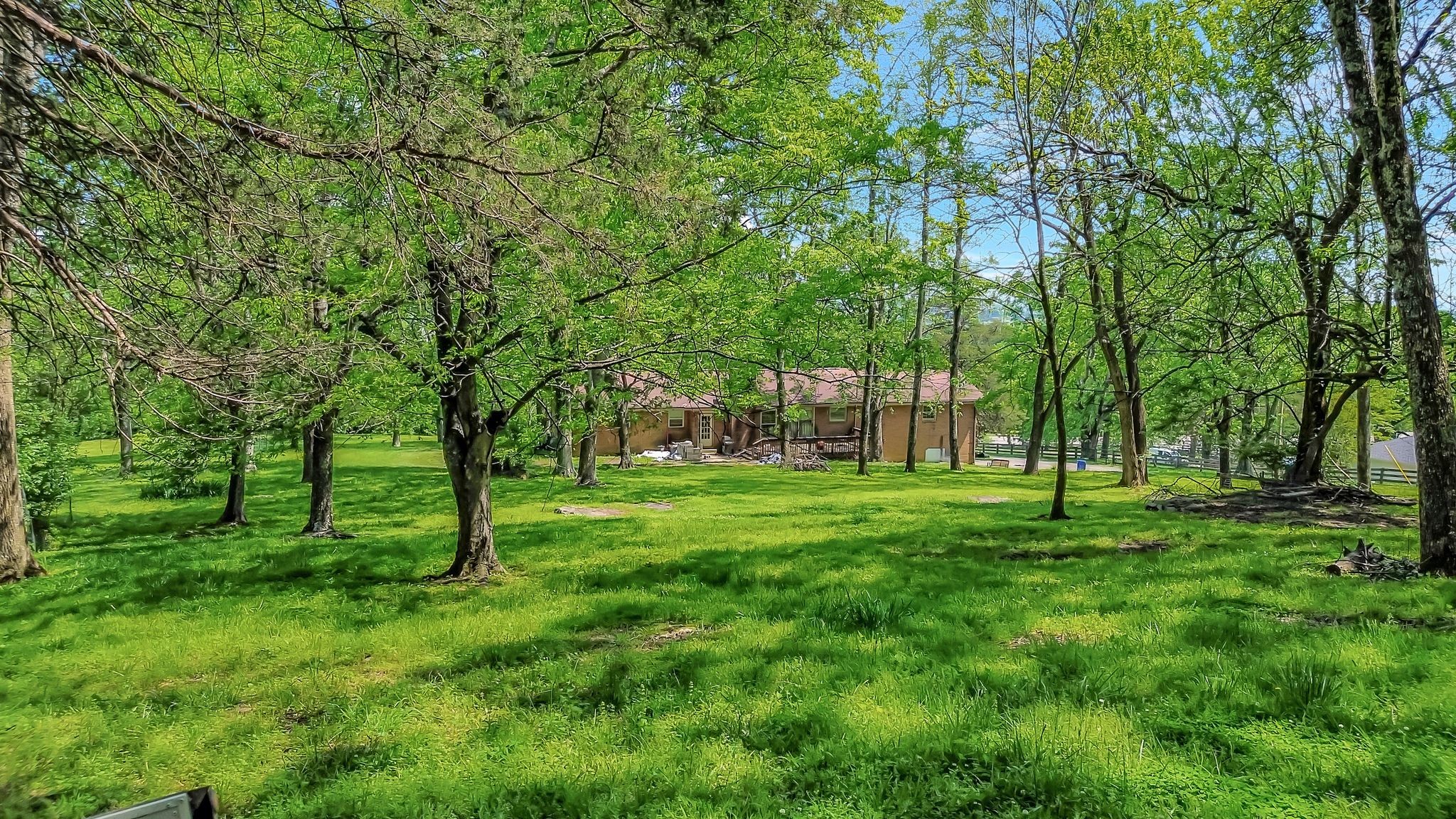 483 Franklin Road Franklin, TN 37069 - Photo 47 of 48 a view of a grassy field with trees