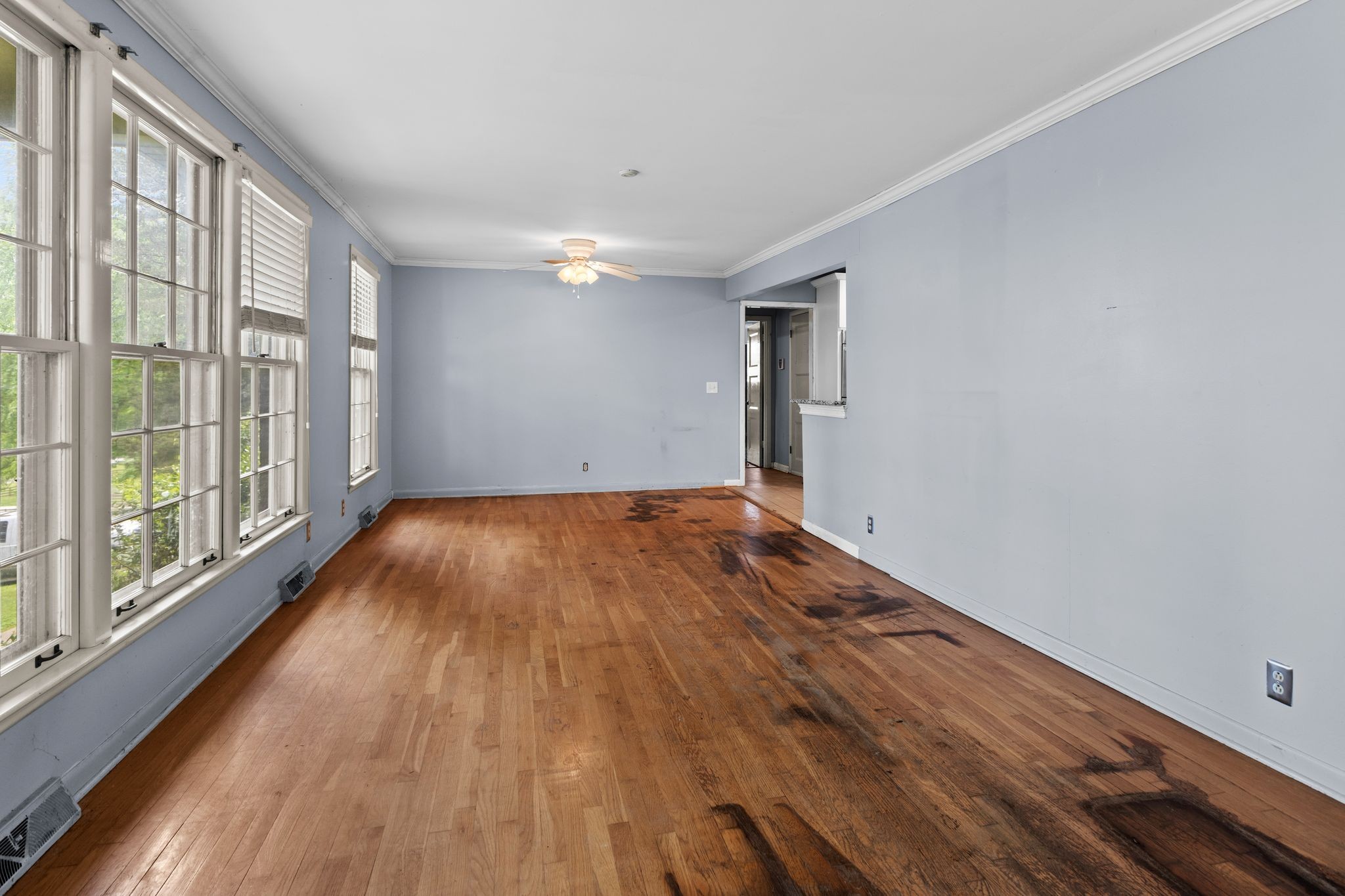 483 Franklin Road Franklin, TN 37069 - Photo 9 of 48 a view of a room with wooden floor and large windows