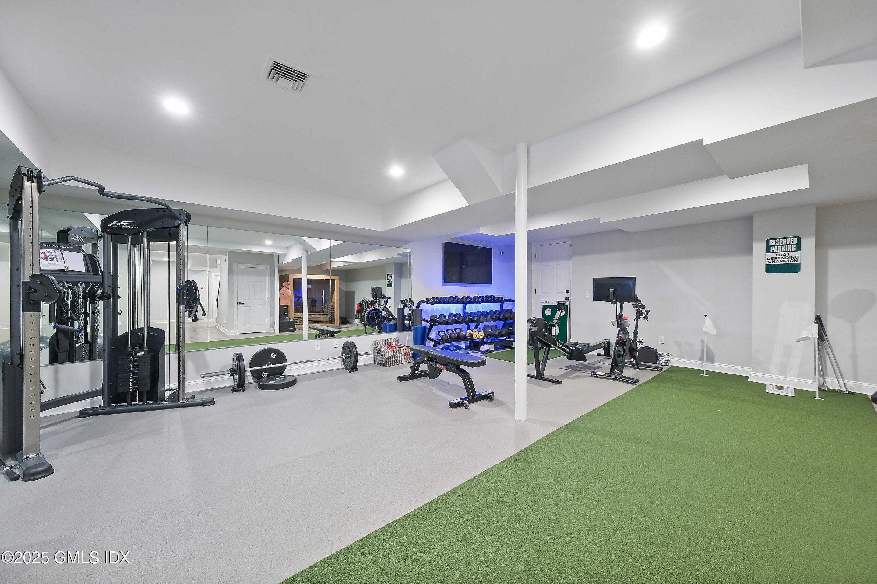 4 Banksville Avenue Greenwich, CT 06831 - Photo 29 of 37 a view of a room with gym equipment