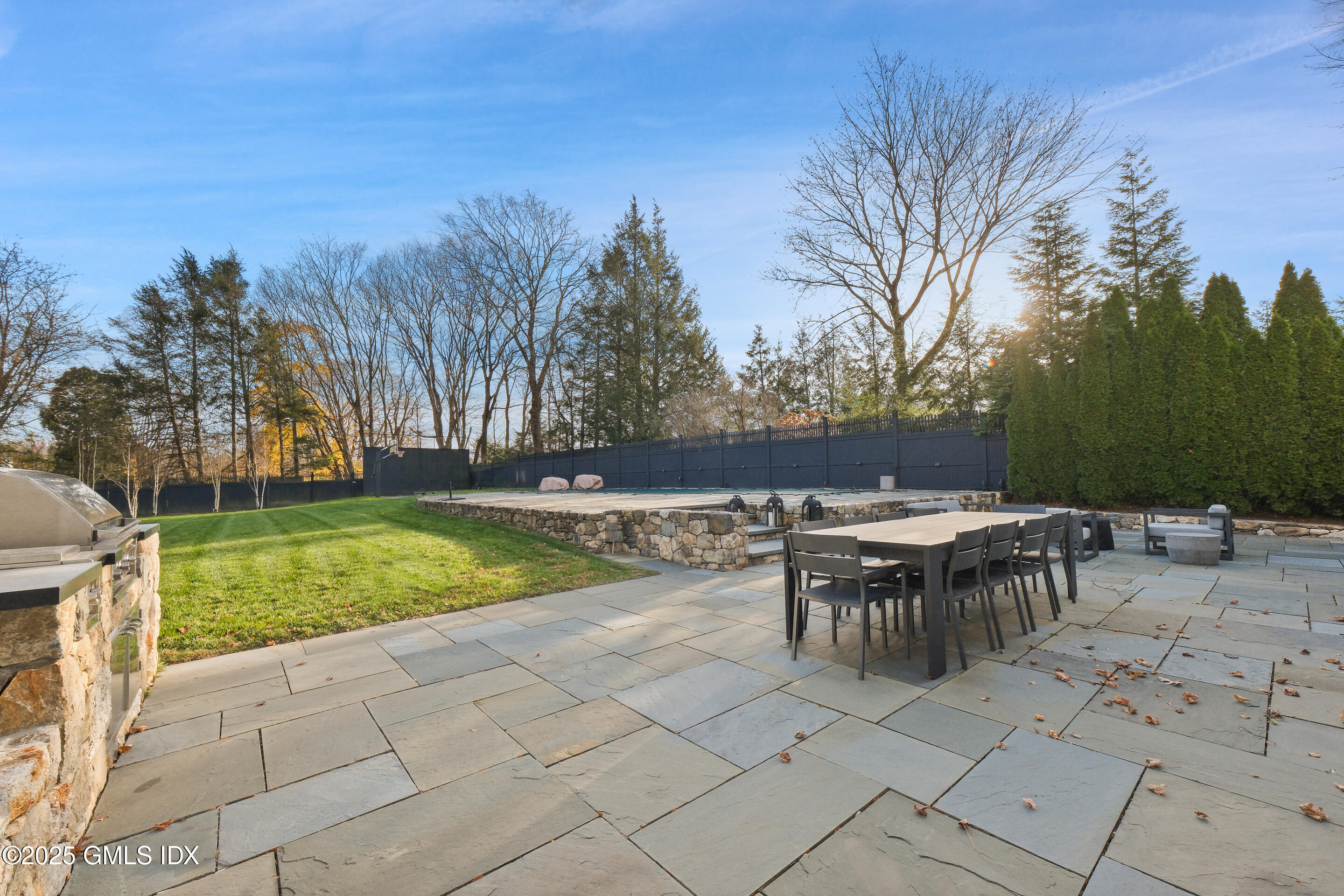 4 Banksville Avenue Greenwich, CT 06831 - Photo 34 of 37 a view of backyard with seating and green space