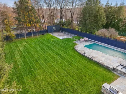a view of a park with large trees