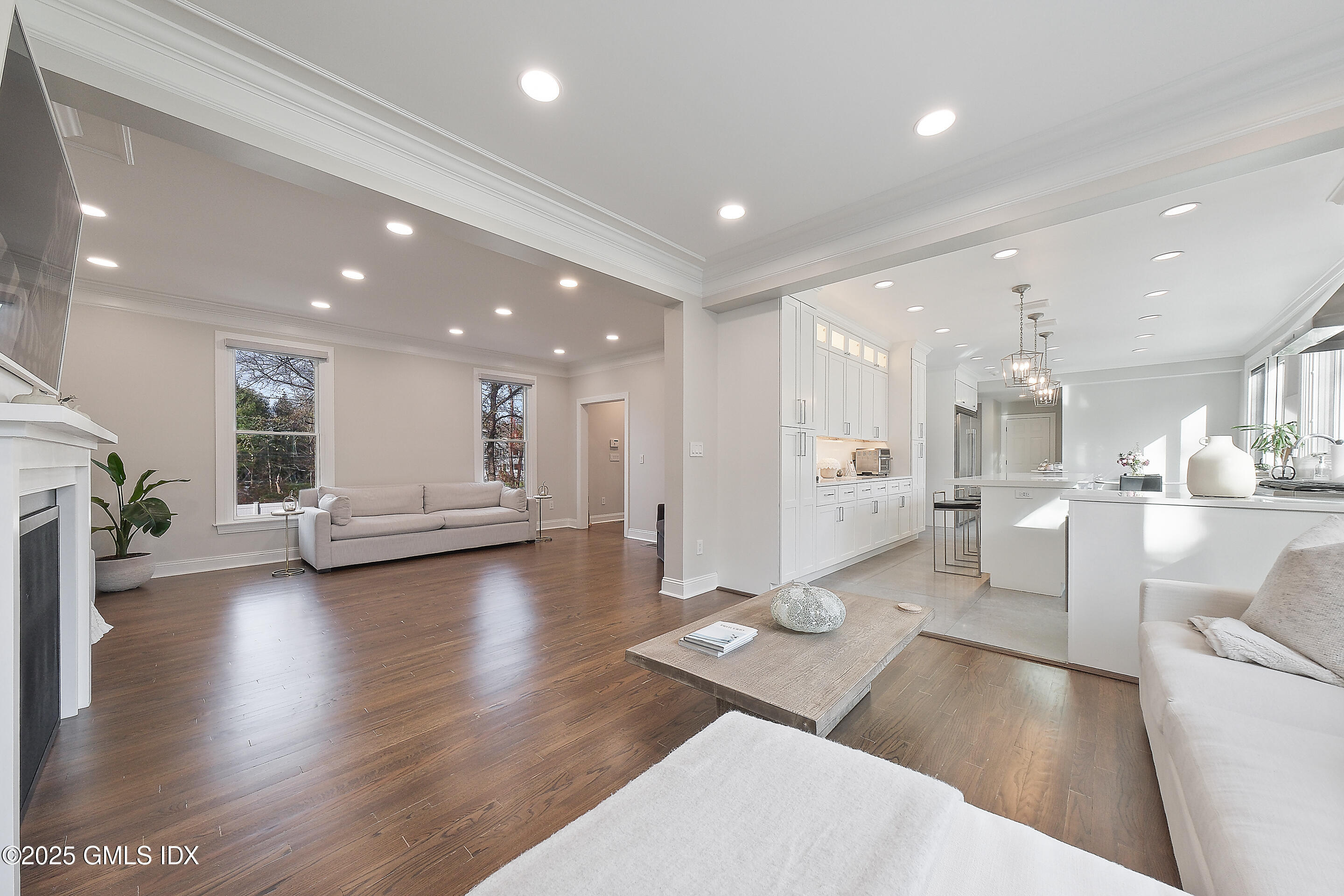 4 Banksville Avenue Greenwich, CT 06831 - Photo 8 of 37 a living room with furniture and a wooden floor