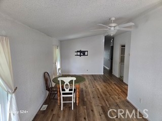 195 Tierra Rejada Road, Unit 29 Simi Valley, CA 93065 - Photo 19 of 33 a view of a workspace with furniture and wooden floor